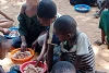 Food distribution at a camp in Mozambique.